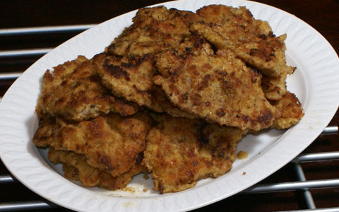 Schnitzelplatte Schnitzel auf einer Servierplatte